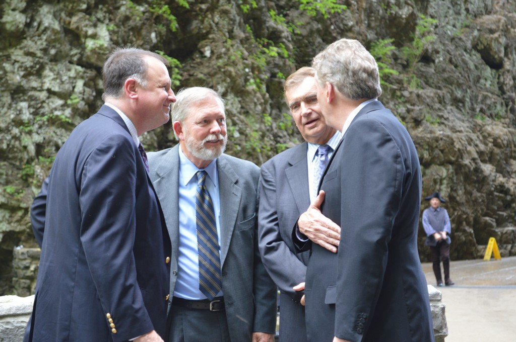 Elton, center, greets Virginia Sen. Creigh Deeds, Sen. Emmett Hanger, and Gov. Terry McAuliffe at Natural Bridge